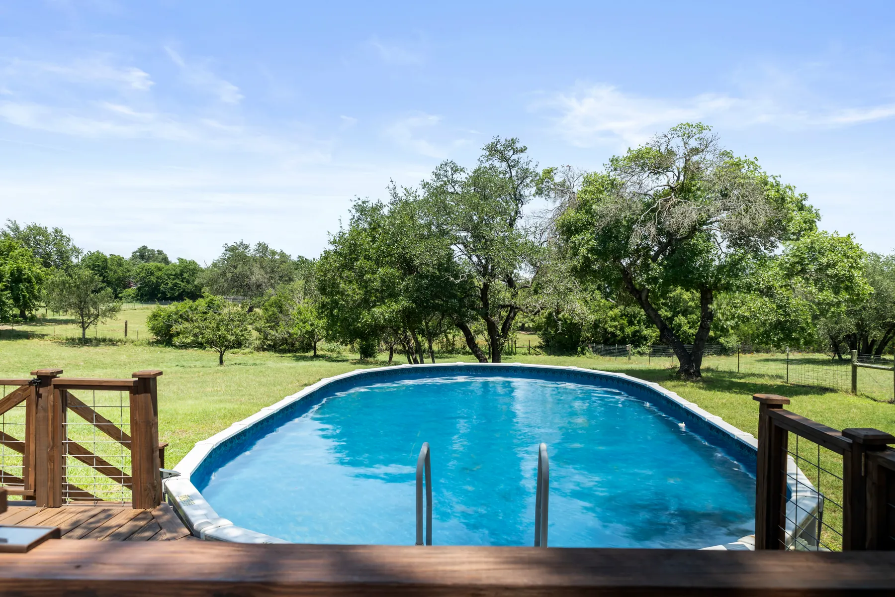 Pool with open acreage beyond