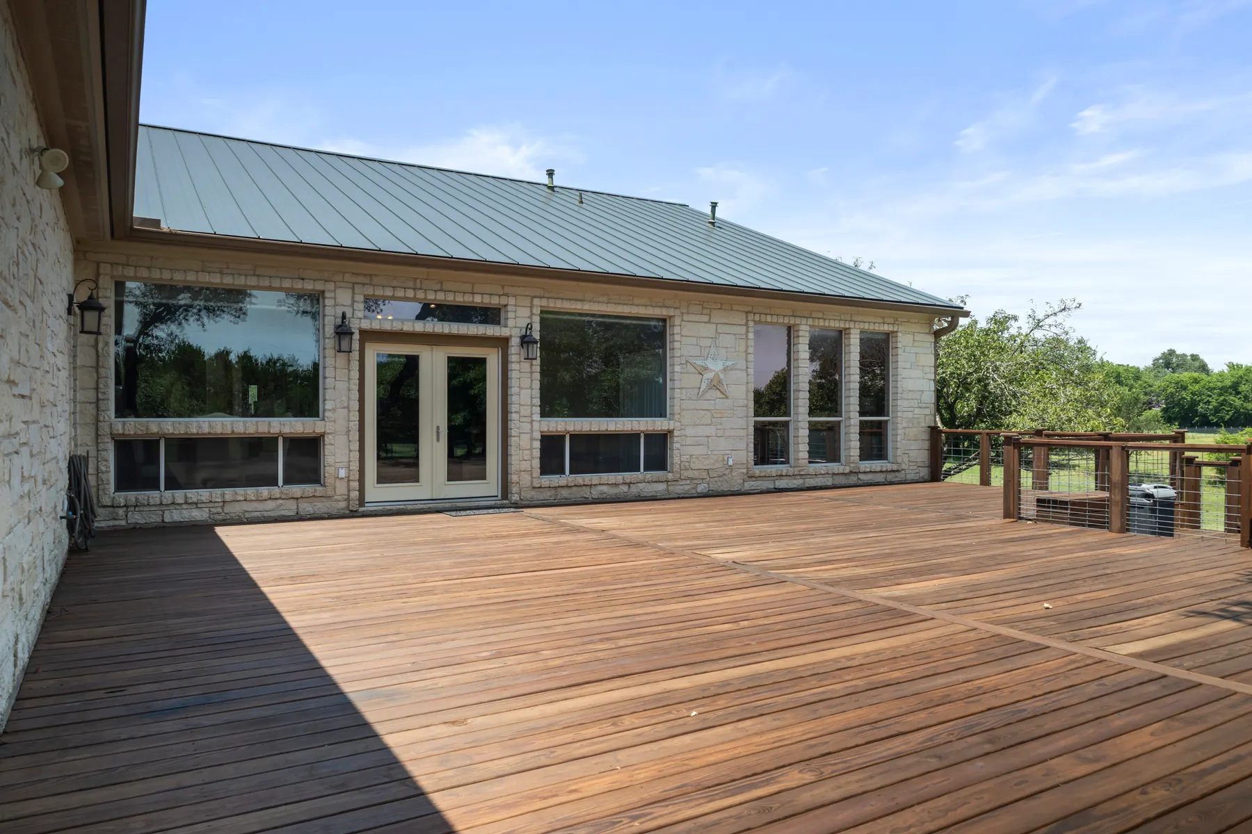 Large rear deck overlooking the property